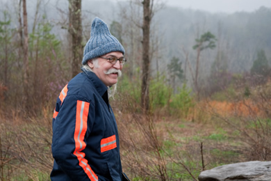 Appalshop filmmaker Herbie Smith, who made a movie about Harriette Arnow. He's walking the Arnow land. Photo by Pat Arnow