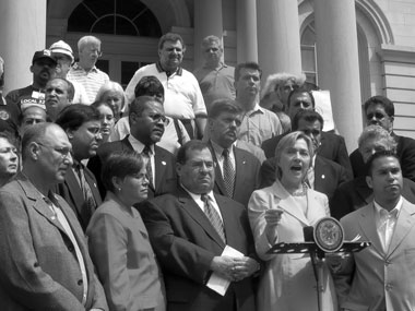 SOMETHING IN THE AIR: With union leaders and fellow elected officials looking on, U.S. Sen. Hillary Rodham Clinton demands an investigation into why Environmental Protection Agency officials assured the public a week after the World Trade Center's destruction that the air in the vicinity was 'safe to breathe' although it had yet to conduct several key tests that uncovered high levels of toxic materials. (9/5/03)