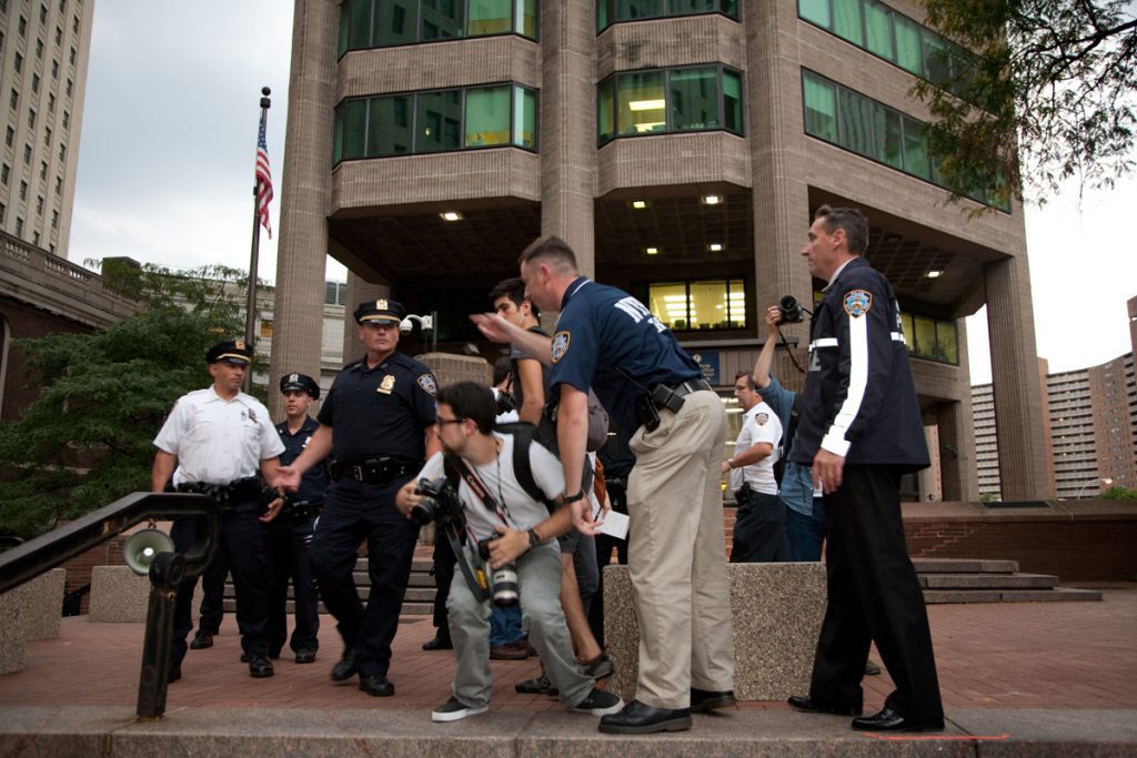 Cops harassing a photographer at 1 Police Plaza Occupy Wall Street demonstration.
